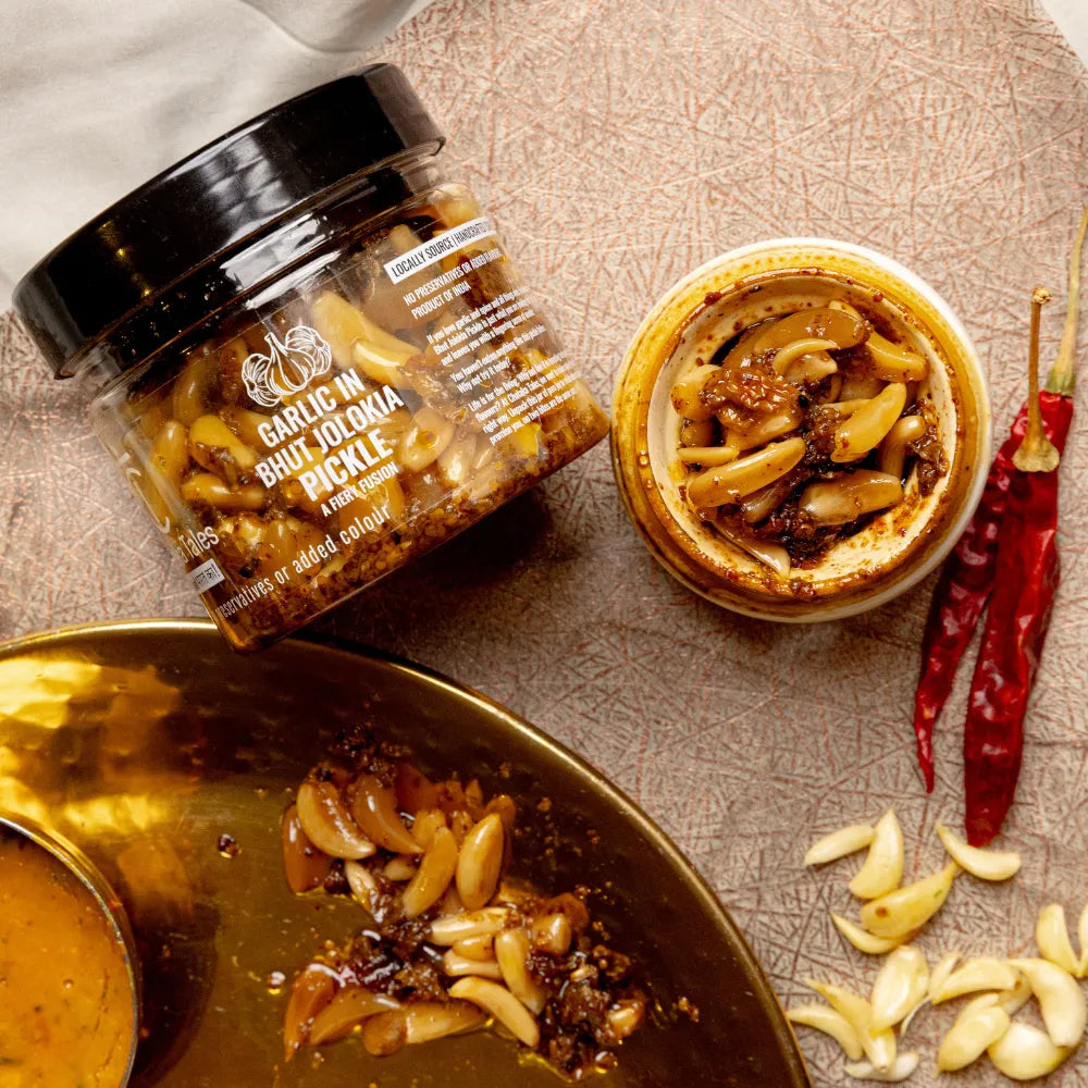 Garlic in Bhut Jolokia Pickle + Turmeric + Wild Olive Pickle image 1